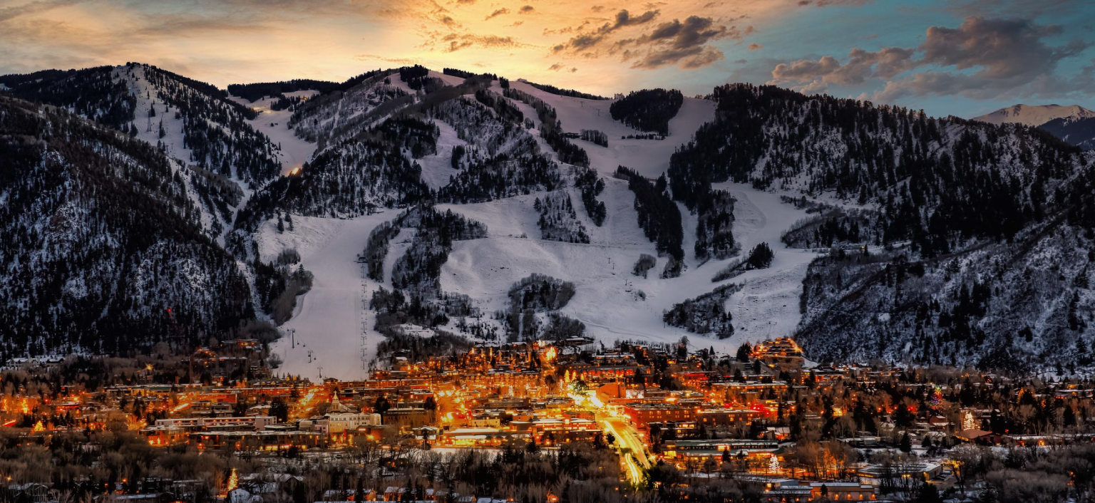 Private vehicle traveling from Denver Airport toward Aspen through Colorado mountains